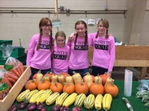 sisters at market